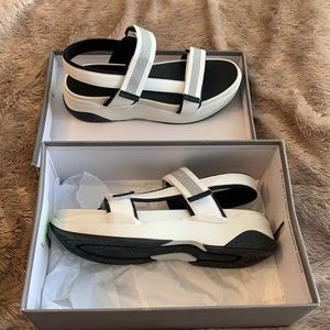 Sandals with a lift! Never worn.